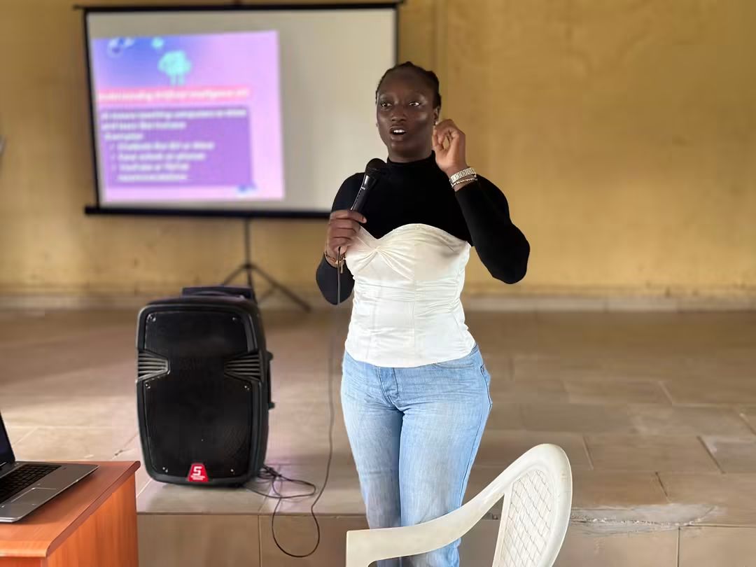 Bonny Joy Kaburuk speaking at the inaugural SheLearns AI Workshop