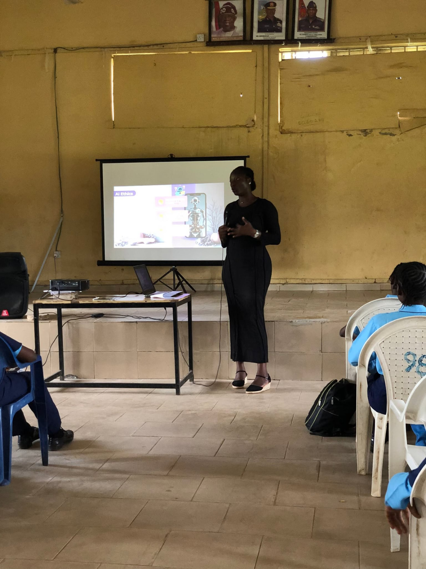 Founder presenting an AI Ethics slide to the students